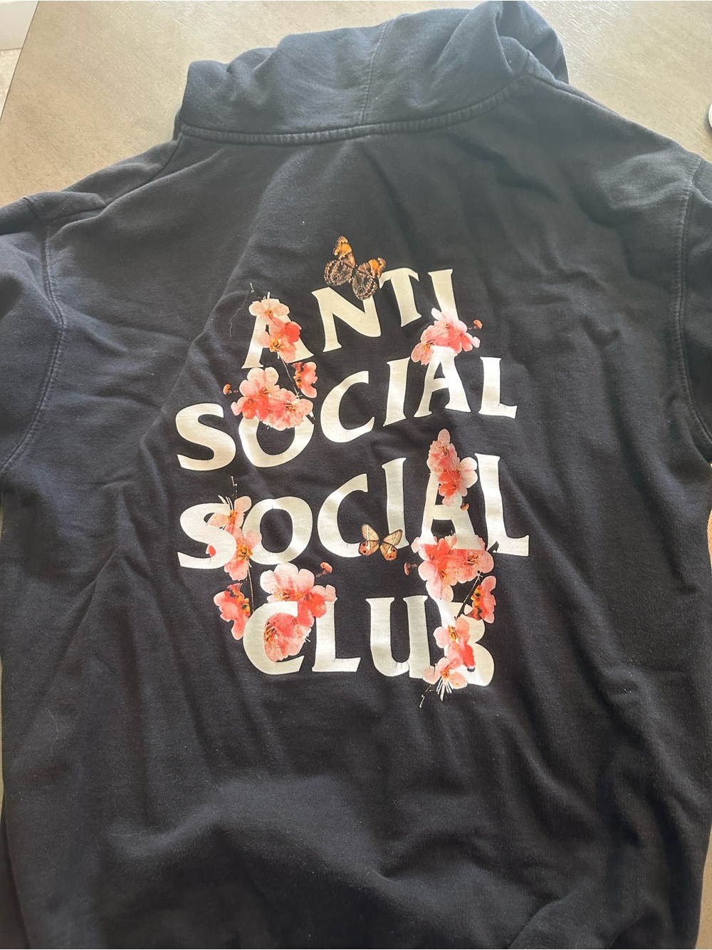 Anti Social Social Club Black Hoodie with Pink Floral Logo